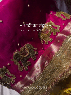 This Pink Banarasi Tissue Silk Saree, Adorned With Intricate Hand Embroidery