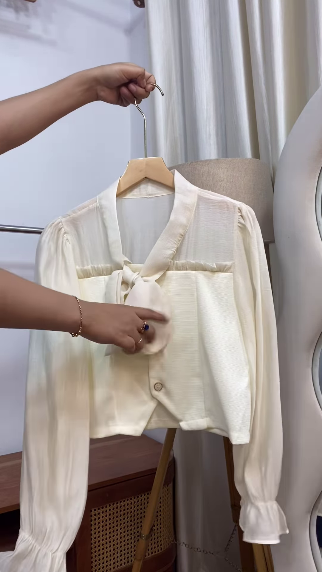 Chic Elegance in Every Thread – Cream Bow-Tie Blouse