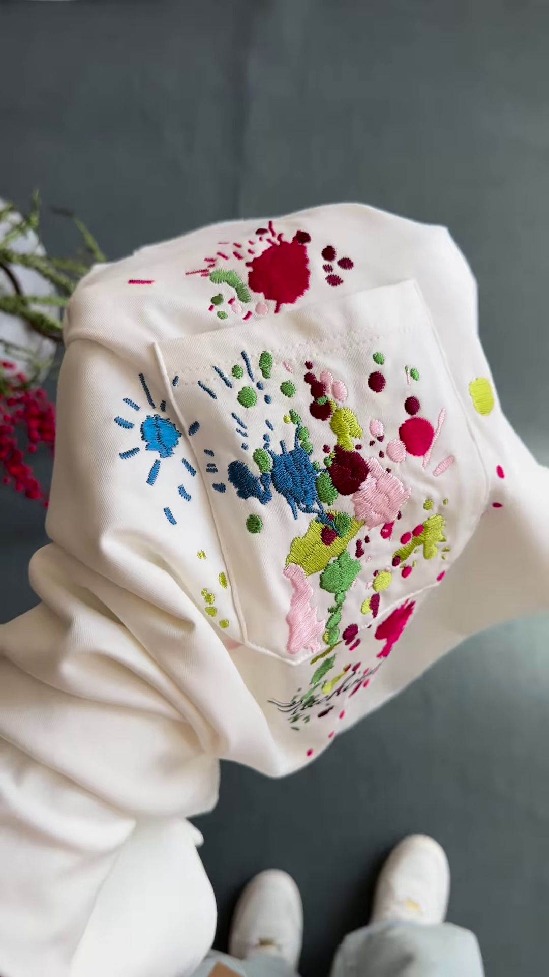 Unisex White & Beige T-Shirts with Colorful Paint Splatter and Pocket Embroidery – Artistic Casualwear for Everyday Styling - Image 4